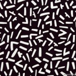 Tissu Planète Vasarely bâtonnet blanc fond noir, plus de tissus sur https://www.tissus-etc.fr/